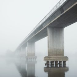 Misty bridge over river in Rangiriri