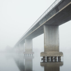 Misty bridge over river in Rangiriri